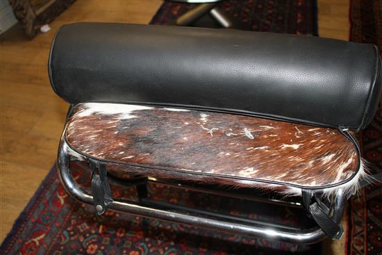 A modernist chromed and black painted steel day bed with pony skin upholstery, L.156cm W.58cm H.80cm